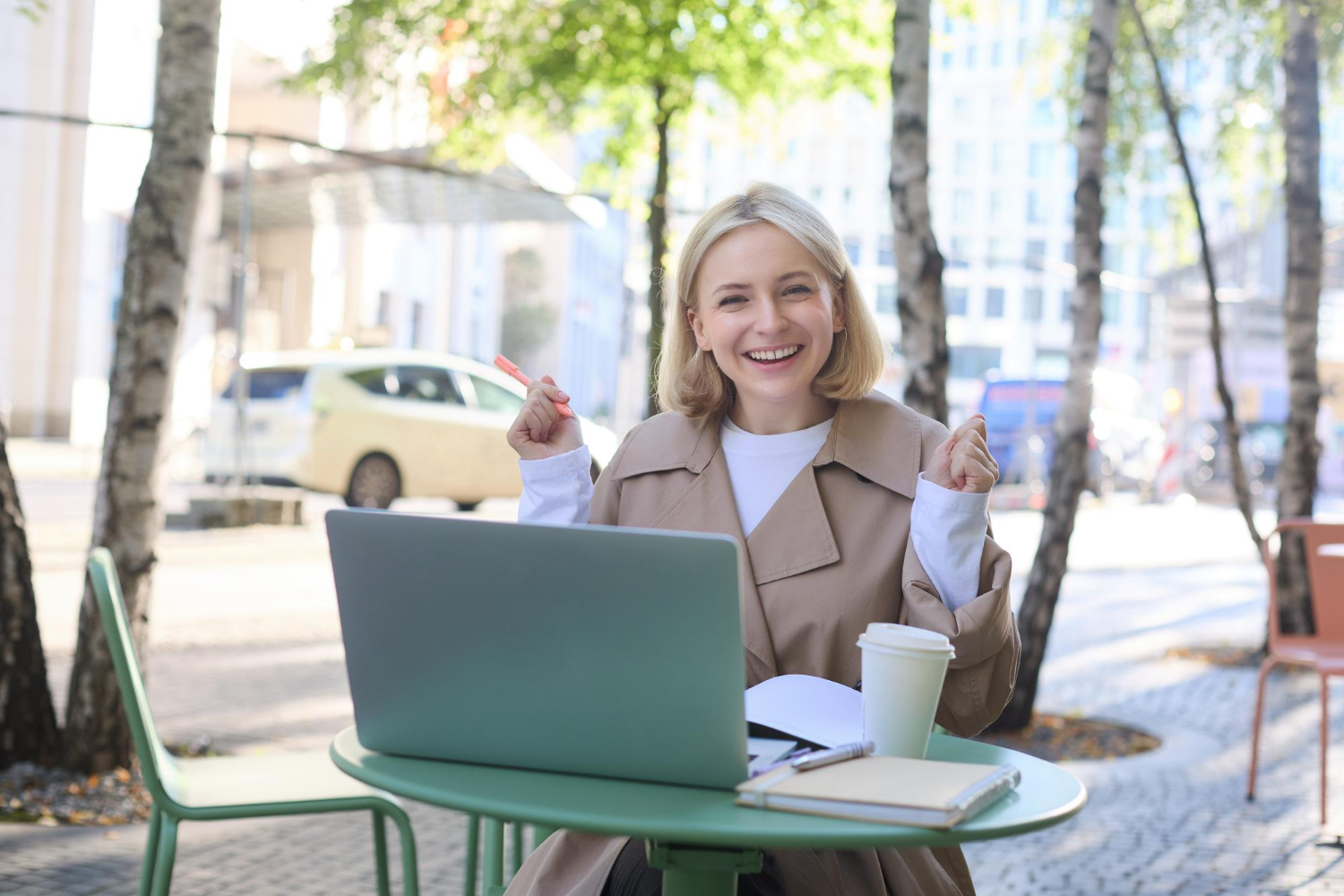 Young girl with headphones smiling during online elementary school class